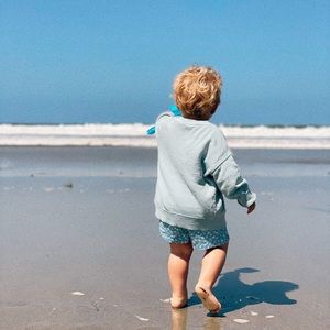 Light blue swim trunks 2-3T